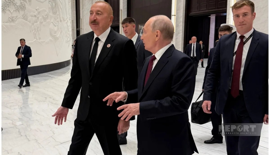 İlham Əliyev Putinlə ayaqüstü görüşdü - FOTOLAR